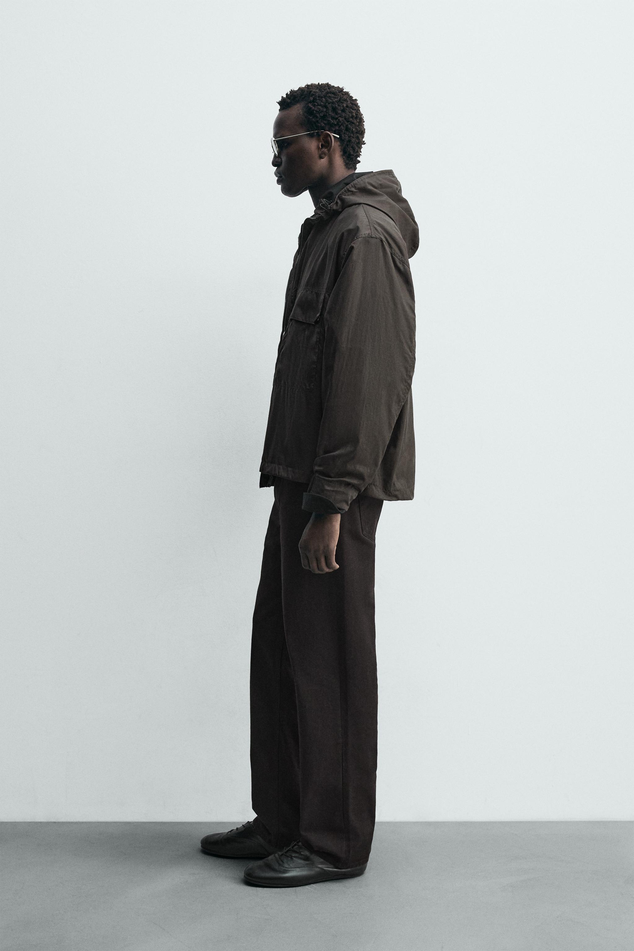 BLOUSON TECHNIQUE À CAPUCHE